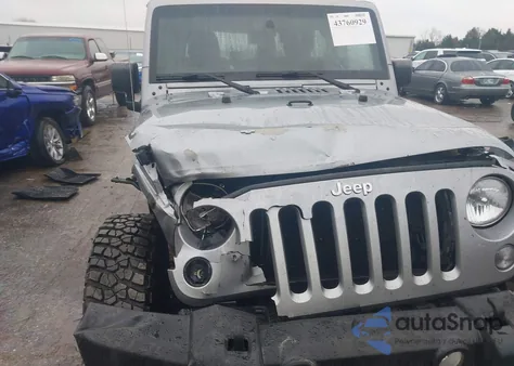 2015 Jeep Wrangler Rubicon z USA, uszkodzony, nr VIN 1C4HJWCG6FL734001